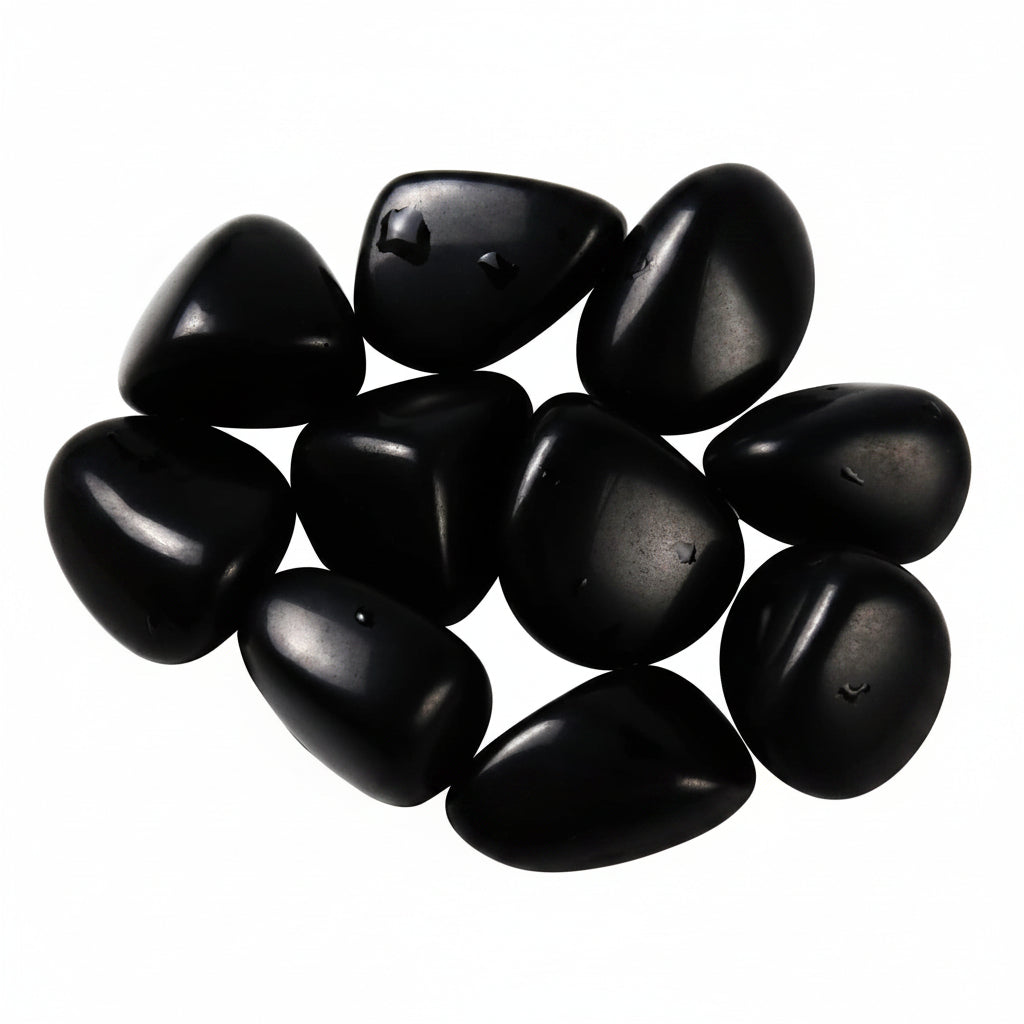 High-polish black obsidian tumbled stones for Feng Shui protection and root chakra grounding