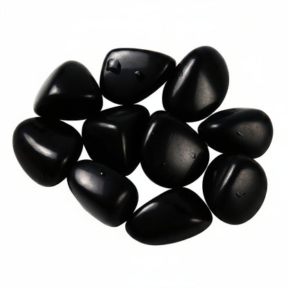 High-polish black obsidian tumbled stones for Feng Shui protection and root chakra grounding