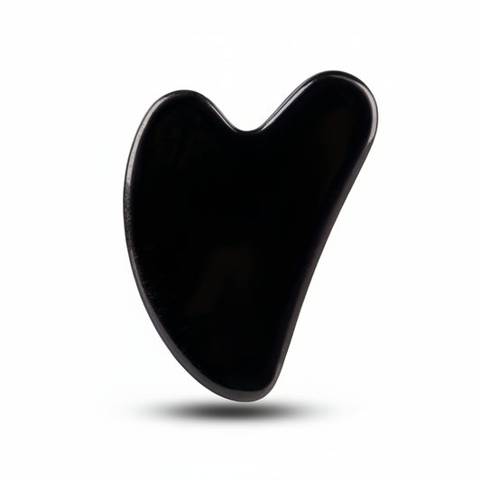 Natural Black Obsidian Gua Sha tool for facial massage and jawline sculpting